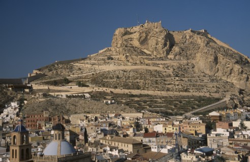 SPAIN, Pais Valenciano, Costa Blanca, "Alicante.  Castle on top of steep, rocky hillside with city