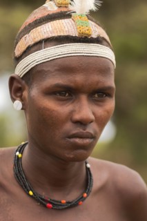 ETHIOPIA, Lower Omo Valley, Village near Omorate, Dassanech man.