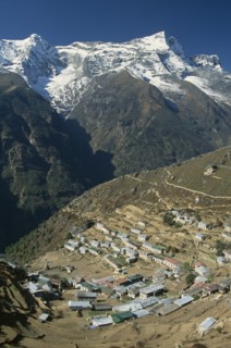 NEPAL, Everest Trek, Namche Bazaar, Elevated view over village rooftops of Namche Bazaar with