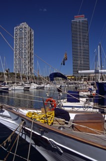 SPAIN, Catalonia, Barcelona, "Port Olimpic, Bow of yacht, marina, Hotel Arts and Torre Mapfre"
