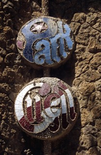 SPAIN, Catalonia, Barcelona, Guell Park sign on building at entrance to Park Guell