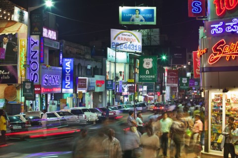 INDIA, Karnataka, Bangalore, "Brigade Road at night, retail and entertainment centre for