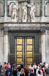 ITALY, Tuscany, Florence, "Tourists in front of the 15th Century East Door of the Baptistry by