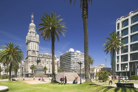 URUGUAY, Montevideo, Plaza Independencia with Palacio Salvo in the background.