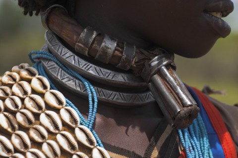 ETHIOPIA, Lower Omo Valley, Key Afir, Banner woman wearing a necklace know as a Bignere - an metal