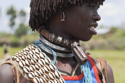 ETHIOPIA, Lower Omo Valley, Key Afir, Banner woman wearing a necklace know as a Bignere - an metal