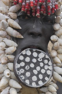 ETHIOPIA, South Omo Valley, Mursi Tribe, Woman with lip plate.