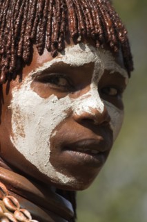 ETHIOPIA, Omo Valley, Mago National Park, "Woman with face painting, her hair greased with ocher