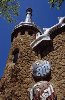 SPAIN, Catalonia, Barcelona, Guell Park sign on building at entrance to Park Guell