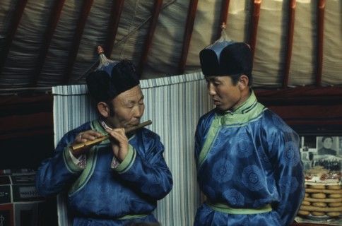 MONGOLIA, Gobi Desert, Biger Negdel, Flute player and chanter in fine traditional silk tunics