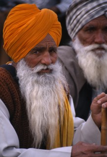 INDIA, Punjab, Near Ludhiana, Elderly Sikh man wearing a turban at the Kila Raipur Rural Sports