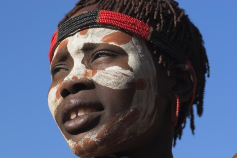 ETHIOPIA, Lower Omo Valley, Mago National Park, Karo woman with face painting.