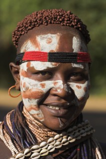 ETHIOPIA, Lower Omo Valley, Mago National Park, Karo woman with face painting.