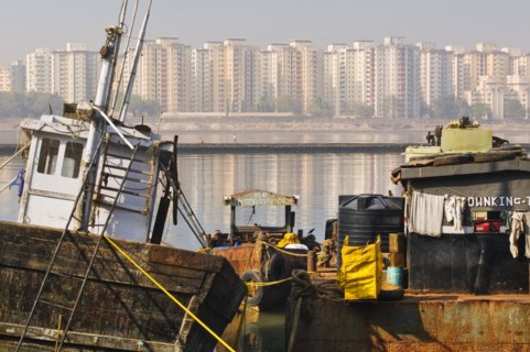 INDIA, Mahararastra, Mumbai, Apartment blocks along the water's edge in South Mumbai.
