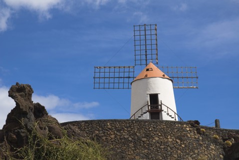 SPAIN, Canary  Islands, Lanzarote, Jardin de Cactus.  Restored windmill in garden in former