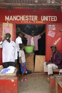GAMBIA, Atlantic Coast, Banjul, "Shop in Gambia's capital Banjul painted red and white, the colours