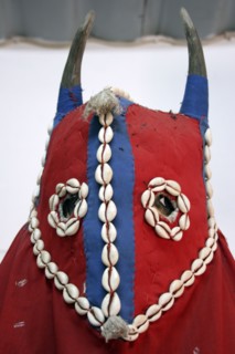 GAMBIA, Atlantic Coast, Banjul, Detail of horned mask of magician’s costume decorated with cowrie