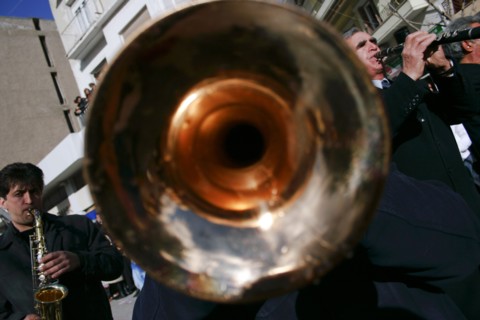 GREECE, Macedonia, Kozani, Greek street musicians playing their instruments at the celebration of