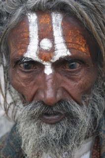 INDIA, Rajasthan, Udaipur, "Portrait of elderly male Hindu beggar outside the Jagdish Temple.  With