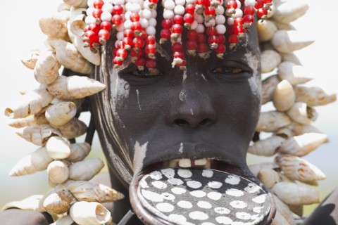 ETHIOPIA, South Omo Valley, Mursi Tribe, Woman with lip plate.