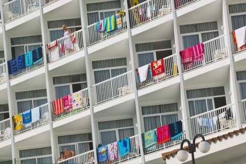 20091064 Hotel balconies with beach towels drying over balustrades. Handrails  Railings  Beaches Espainia Espana Espanha Espanya European Hispanic Holidaymakers Resort Sand Sandy Seaside Shore Souther...