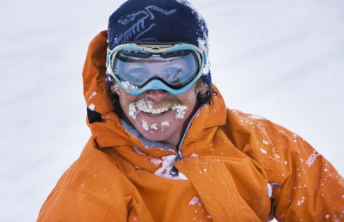 20091050 Close up skier wearing protective snow goggles. Model Released American Holidaymakers North America One individual Solo Lone Solitary Skiing Skis Tourism Tourist United States America  Weathe...