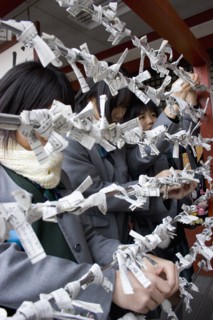 JAPAN, Honshu, Tokyo, Asakusa Kannon or Senso-ji Temple.  Three young Japanese female students