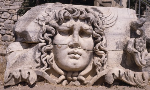 TURKEY, Altinkum, Didyma, Temple of Apollo.  Carved head of Medusa.
