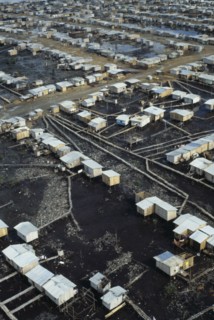 ECUADOR, Guayas Province, Guayaquil , Aerial view over slum housing with stilt buildings built over