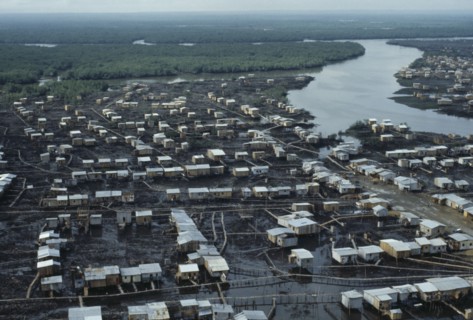 ECUADOR, Guayas Province, Guayaquil , Aerial view over slum housing with stilt buildings built over