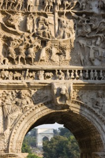 ITALY, Lazio, Rome, The Forum with the Arch of Titus seen through the Arch of Septimius Severus