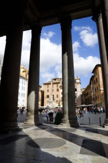 ITALY, Lazio, Rome, Piazza della Rotonda seen through the granite columns of the Pantheon with