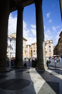 ITALY, Lazio, Rome, Piazza della Rotonda seen through the granite columns of the Pantheon with