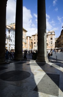 ITALY, Lazio, Rome, Piazza della Rotonda seen through the granite columns of the Pantheon with