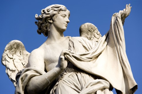 ITALY, Lazio, Rome, Statue of a winged female angel on the Ponte Sant Angelo bridge over the River