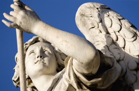 ITALY, Lazio, Rome, Statue of a winged female angel on the Ponte Sant Angelo bridge over the River