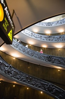 ITALY, Lazio, Rome, Vatican City Museums Tourists descending the Spiral Ramp designed by Giuseppe