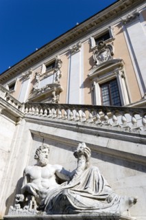 ITALY, Lazio, Rome, Palazzo Senatorio on the Capitol with a staircase by Michelangelo and a statue