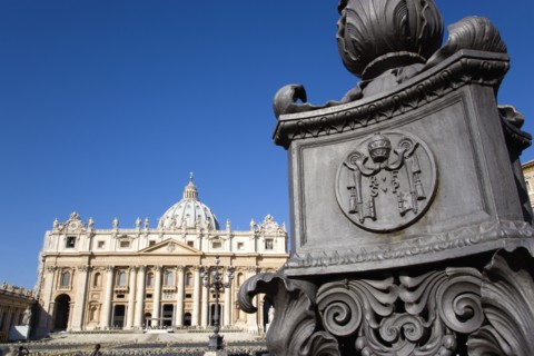 ITALY, Lazio, Rome, Vatican City The Basilica of St Peter and a detail of a lamppost in the square