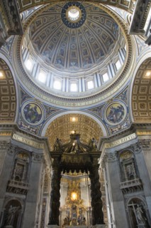 ITALY, Lazio, Rome, Vatican City The Dome of St Peter's designed by Michelangelo above the gilded
