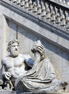 ITALY, Lazio, Rome, Palazzo Senatorio on the Capitol with a staircase by Michelangelo and a statue