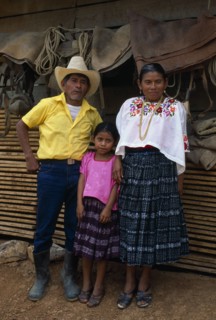 GUATEMALA, Tribal People, Q’eqchi, "Full lengh standing portrait of a Q’eqchi Indian family, a rich