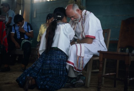 GUATEMALA, Alta Verapaz, Religion, Padre Tiziano an Italian Roman Catholic missionary taking
