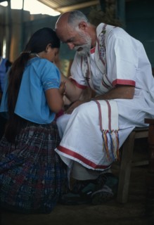 GUATEMALA, Alta Verapaz, Religion, Padre Tiziano an Italian Roman Catholic missionary taking