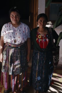 GUATEMALA, Alta Verapaz, Coban, Roman Catholic Mission. Full length standing portrait of two Quiche