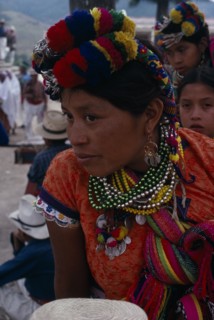 GUATEMALA, El Quiche, San Andres de Sacabaja, Quiche Indian woman wearing traditional colourful