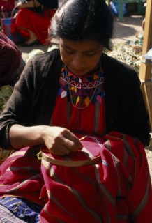 GUATEMALA, Chimaltenango, Patzun, Kakchiquel Indian woman making a huipile blouse