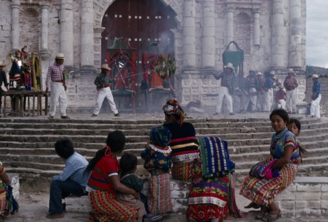GUATEMALA, El Quiche, San Andres de Sajcabaja, Quiche Indians watching fireworks in front of the
