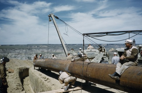 CANADA, Saskatchewan , Prairies, Constructing Trans Canada gas pipeline over Saskatchewan Prairies.