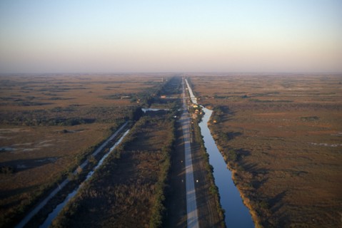 USA, Florida, Everglades, Aerial view over drainage canal and highway